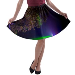 Illuminated Trees At Night A-line Skater Skirt by Nexatart