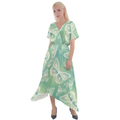 Turquoise Light Green Butterfly Pattern Cross Front Sharkbite Hem Maxi Dress by SpinnyChairDesigns